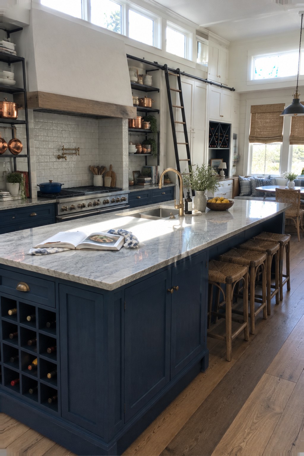 A large navy blue kitchen island with a marble countertop, drawers, cupboards, and a built-in wine rack.